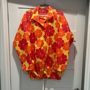 Vibrant Flower Power Vintage Rain Jacket.